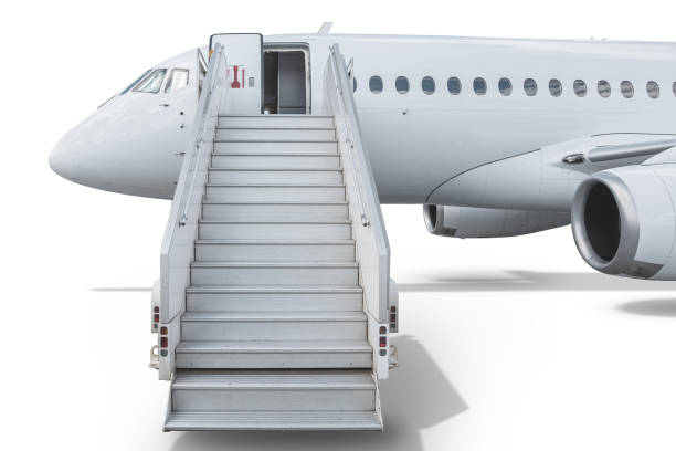 istock Passenger aircraft with boarding ramp isolated on white background 1433083445