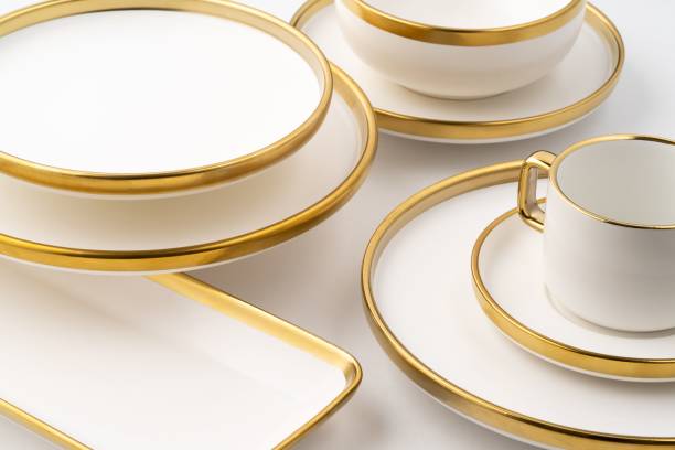 istock Set of white and brown ceramic plate and cup on a white background 1433085056