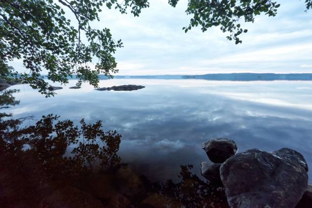 istock Scenic waterscape with a rocky shore during daytime 1433085123