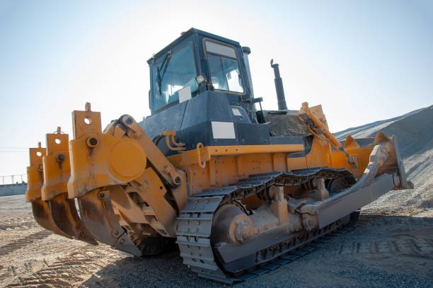 bulldozer parked on dirt