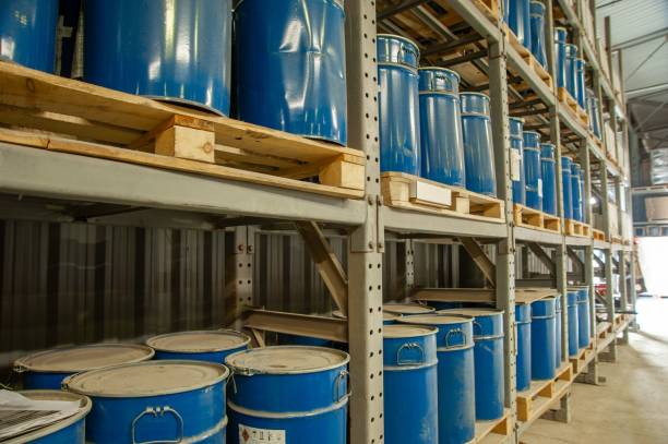 istock Warehouse with blue industrial metal barrels 1433085485