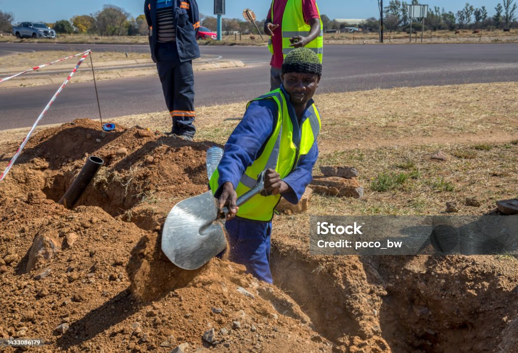 Number 5 Digging Workers Digging Stock Photo - Download Image Now - 30-34 Years ...