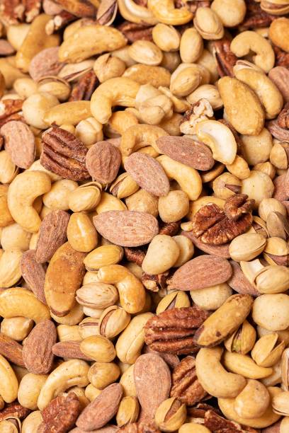 istock Vertical closeup shot of tasty salted mixed nuts 1433087827
