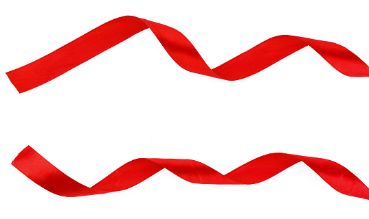 Shiny red satin ribbon isolated on white background