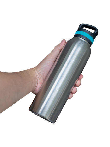 istock Male hand holding stainless bottle isolated on white background. 1433088431
