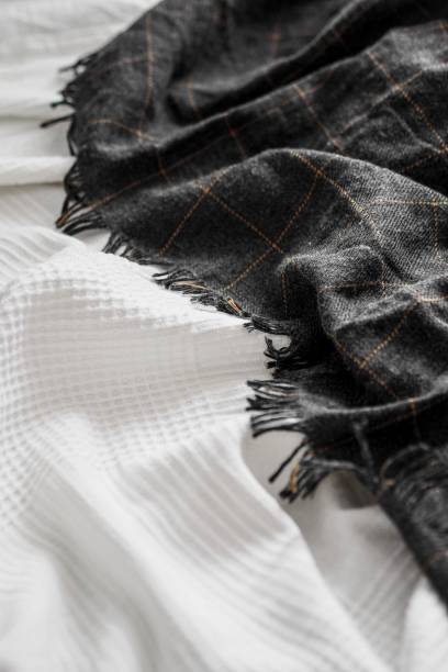 istock Vertical shot of a blanket and bedsheets 1433088945