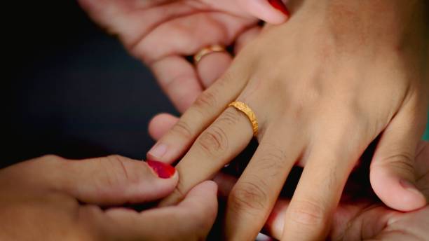 istock Golden ring on a man's hand 1433089796
