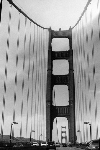 A monochromatic scenery of the Golden Gate Bridge in San Francisco, USA on a gloomy sky