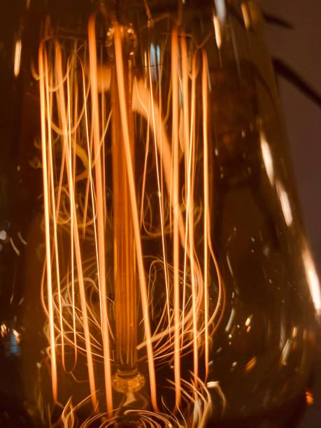istock Closeup of vintage filament light bulb 1433093325
