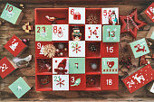 old wooden advent calendar with vintage decoration