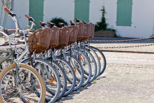 Bicycles of all types and for all ages are available to hire across Ile de Ré, as can be seen here on a forecourt in the principal town, Saint-Martin-de-Ré.With 100km of bike paths and a high point of 19m above sea level, the island Ile de Ré is a haven for leisure cyclists of all ages.