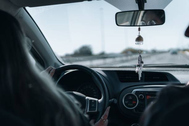 istock Caucasian female driving car 1433094755