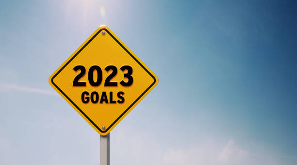 istock Yellow Off Road Traffic Sign With 2023 Goals Text Before Blue Sky 1433094831
