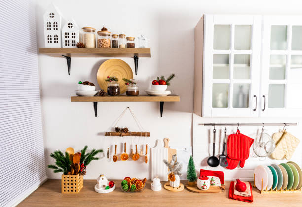 istock beautiful interior of a modern white kitchen with various kitchen utensils and decorations for Christmas and New Year. clean eco kitchen. 1433094988
