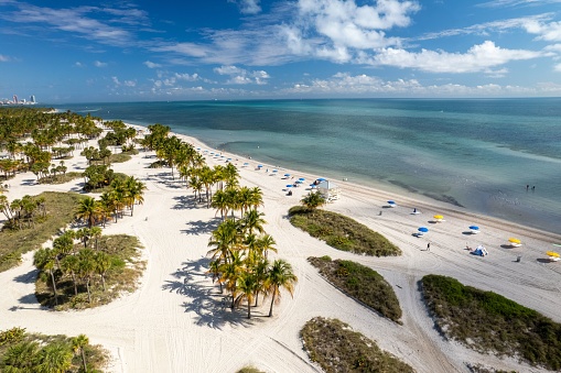 An aerial view of Crandon Park Beach in Key Biscayne on a sunny day in Miami, Florida
