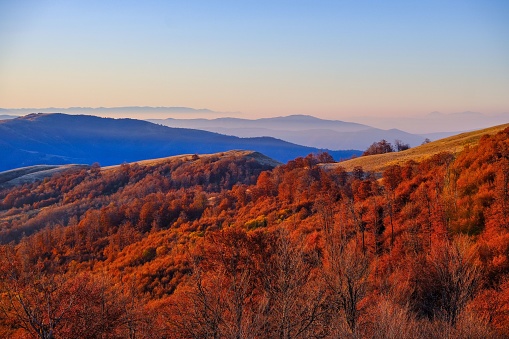 The landscape of Stara Planina Mountain at a soft orange sunset
