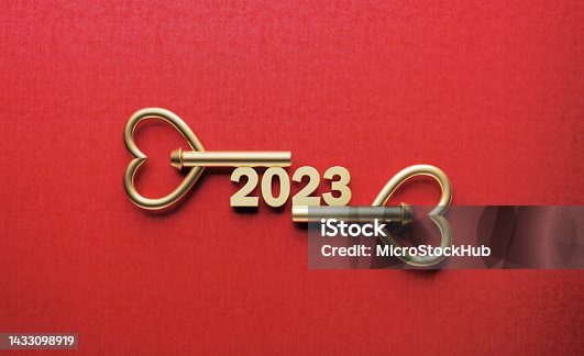 istock 2023 Word Written By Gold Colored Keys On Red Background 1433098919