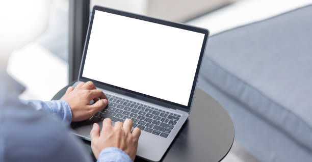 istock Young man working on he laptop with blank copy space screen for your advertising text message in office, Back view of business women hands busy using laptop at office desk. 1433100396
