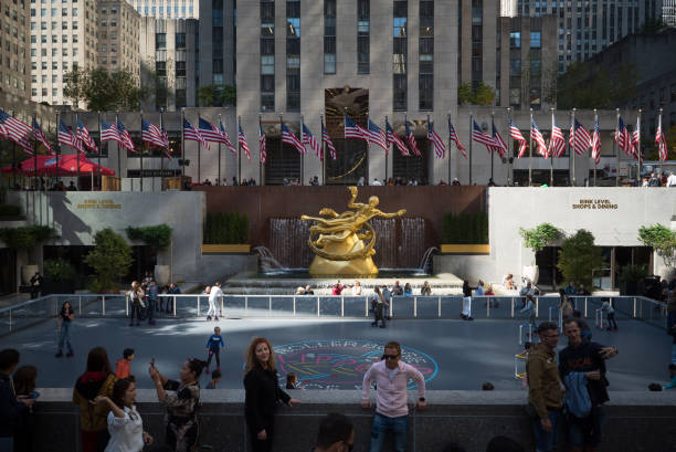 New York Manhattan, New York. October 11, 2022. Tourists at the Rink at Rockefeller Center. rockefeller ice rink stock pictures, royalty-free photos & images