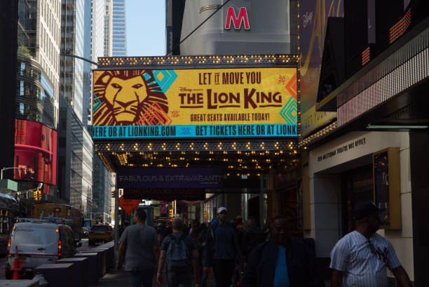 New York Manhattan, New York. October 11, 2022. Amsterdam Theatre "the Lion King" neon advertising sign on 42nd street in Times Square. manhattan theater district stock pictures, royalty-free photos & images