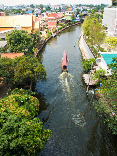 istock Long-tail passenger boat in Bangkok canal 1433104667