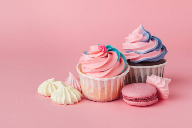 istock Yummy cupcake on light pink background close up 1433105083
