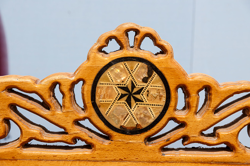 Wood carving ornament, dark, brown wood, close up