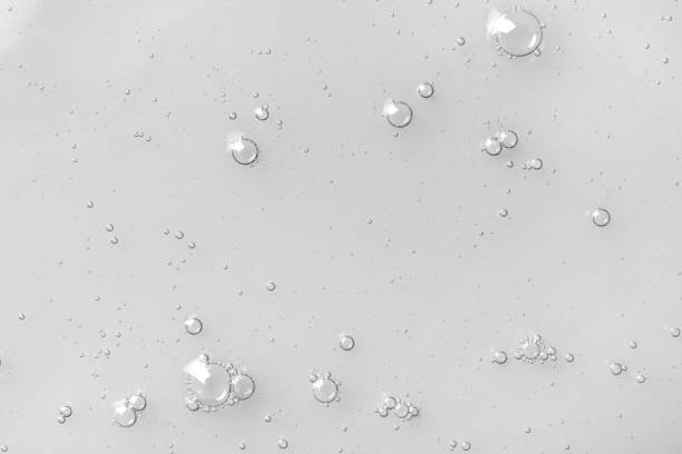 istock Hydrophilic oil with bubbles on white background, top view 1433107721