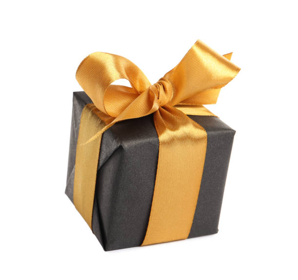 istock Beautiful gift box with golden ribbon and bow on white background 1433107829
