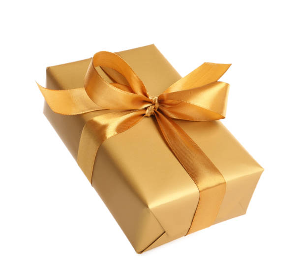 istock Gift box with golden ribbon and bow on white background 1433107897
