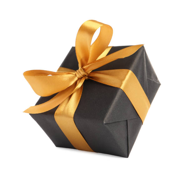 istock Beautiful gift box with golden ribbon and bow on white background 1433108316