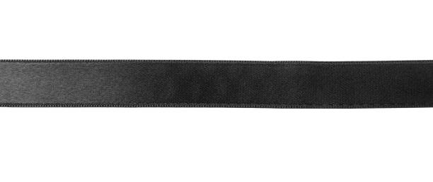 istock Black satin ribbon on white background, top view 1433109870