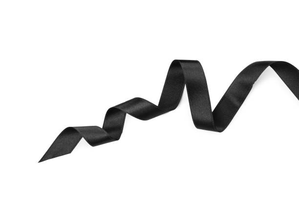 istock Black satin ribbon on white background, top view 1433110371