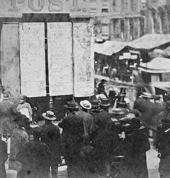 istock New York City, people reading newspaper on public boards 1433111618