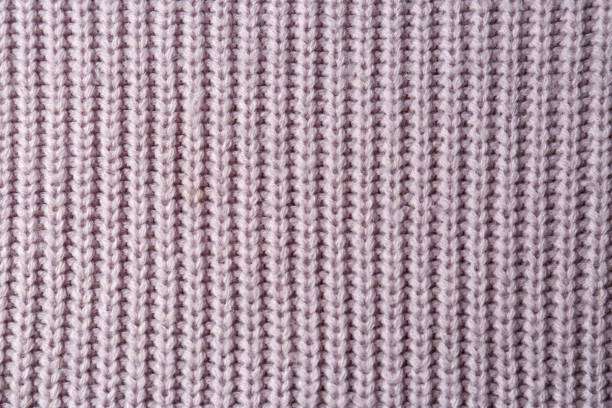 istock Beautiful violet knitted fabric as background, top view 1433112862