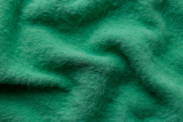 istock Beautiful green fabric as background, top view 1433113196
