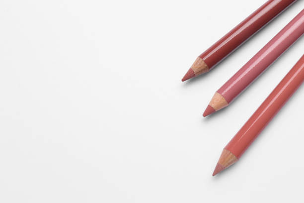 istock Different lip pencils on white background, top view. Cosmetic product 1433114487