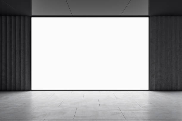 istock Front view on big blank white illuminated screen with place for your logo or text in empty room with glossy dark ceiling and grey floor. 3D rendering, mock up 1433115027