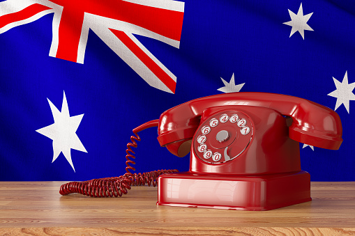 Diplomacy Concept Retro Phone with Australian Flag. 3D Render