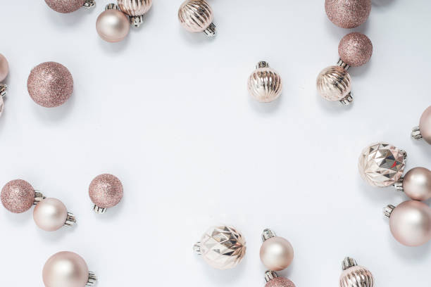 istock Beautiful golden decorative balls on a white background. Top view, flat lay. 1433127564