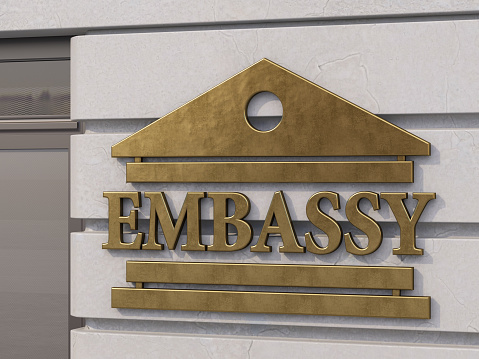 Bronze Embassy Sign on Buildings Wall. 3D Render