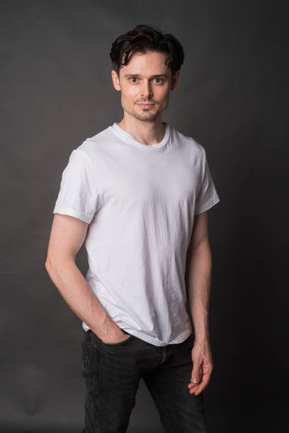 istock Studio portrait of handsome man against gray background 1433130146