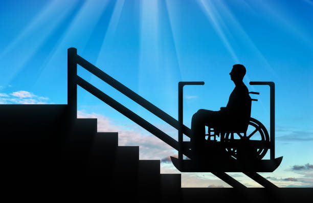 istock Disabled person climbs on elevator for disabled on stairs 1433132387
