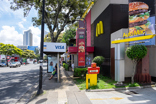San Jose, Costa Rica - September 17, 2022: Shopping centers and modern buildings on Paseo Colon, a central avenue in the city