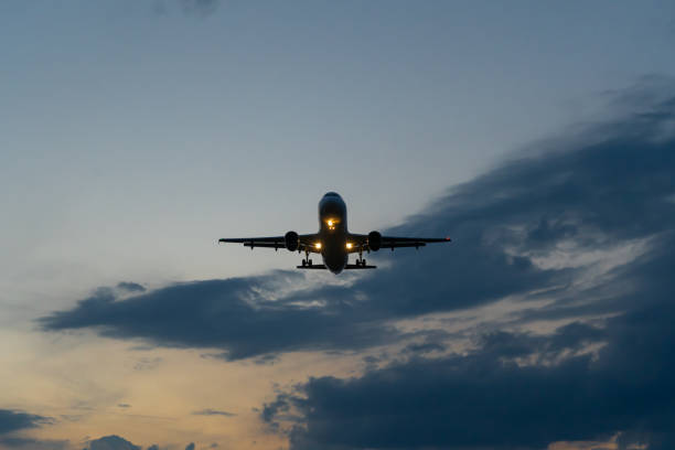 Airplane is landing stock photo