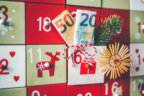 Close up or Santa Claus or Saint Nicholas wearing costume walking away after leaving presents and many gift boxes by Christmas tree. Merry Christmas and happy holidays concept