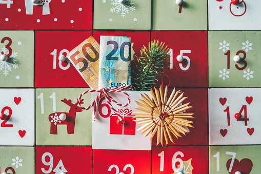 euro banknotes sticking in advent calendar