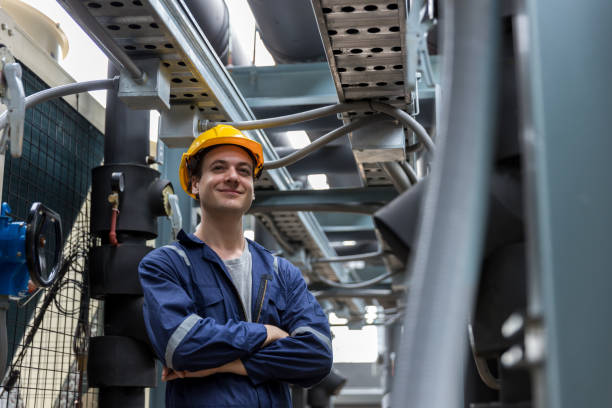 istock Industrial engineer standing  cross one's arm on site. engineer at industrial site. Inspector engineer check and working on site 1433136294