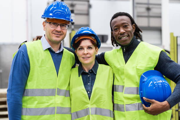 istock Team of engineers working inside robotic factory - Industry concept 1433137518