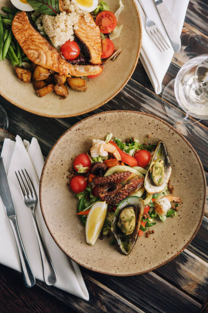 istock Top view seafood dishes on wooden table 1433138793